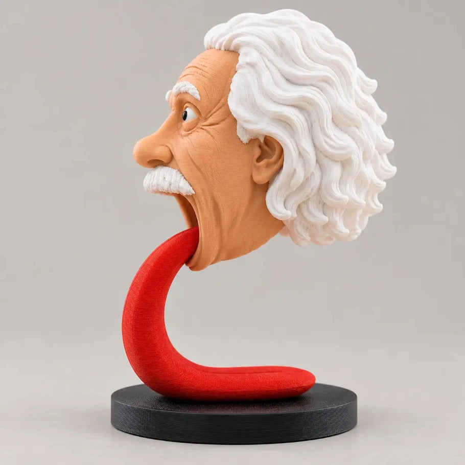 Left side profile of an Einstein-inspired 3D printed headphone stand showing the detailed face, white wavy hair, red curved tongue support, and black circular base against a neutral background.