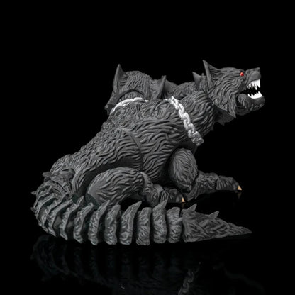 Monster-like creature with sharp teeth and a chain on a black background