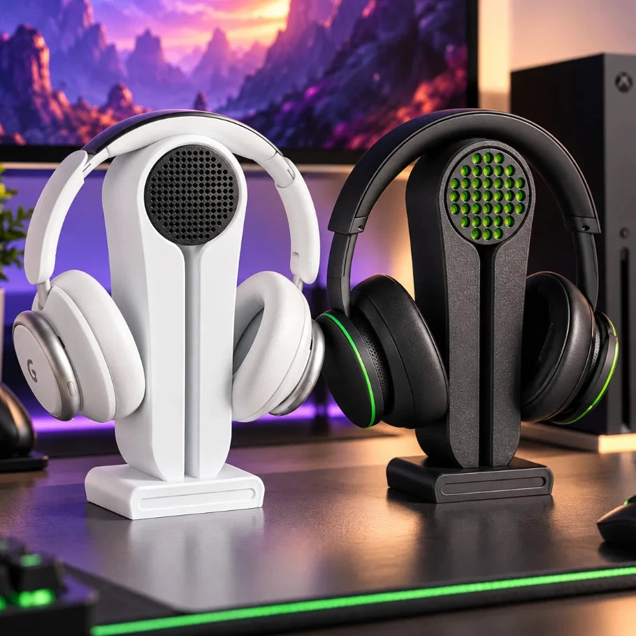 White and black headphone stands with speaker-grille design on an RGB gaming setup - Fictioo