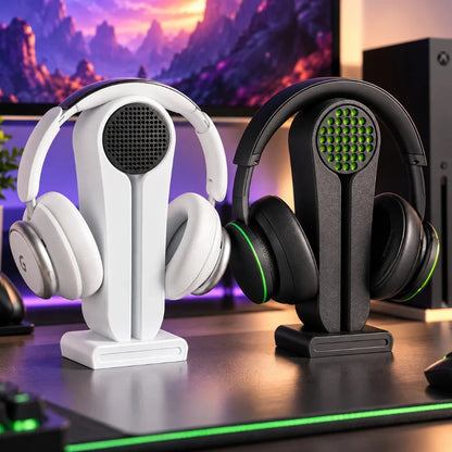 White and black headphone stands with speaker-grille design on an RGB gaming setup - Fictioo
