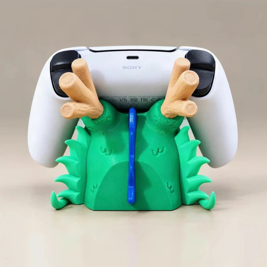 PS5 controller held in the mouth of a green dragon controller stand - Fictioo