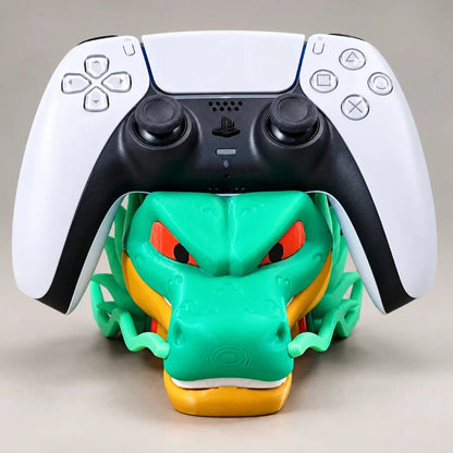 PS5 DualSense controller resting on a green dragon head controller stand - Fictioo