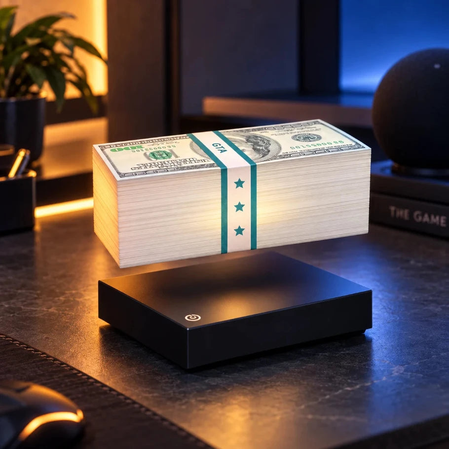 Floating money stack levitation lamp on a black square base in a premium gaming setup