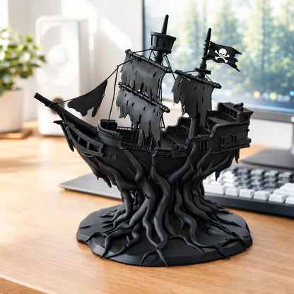 black worn out pirate ship wrapped in roots on a wooden gaming desk