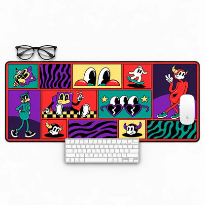 Fictioo colorful cartoon deskmat with retro comic panels, paired with a white keyboard, white mouse and black glasses on a white desk