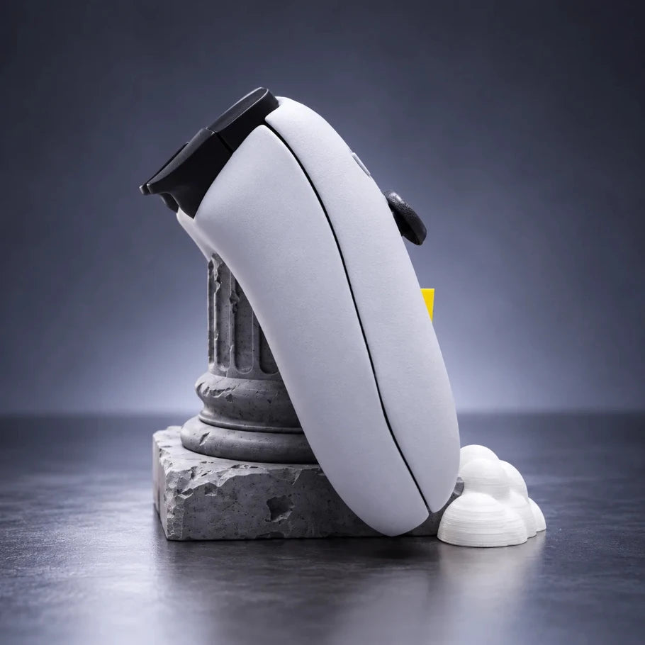 Side view of Olympus Pillar PS5 controller stand with stone pillar design, yellow lightning bolt and cloud accents 