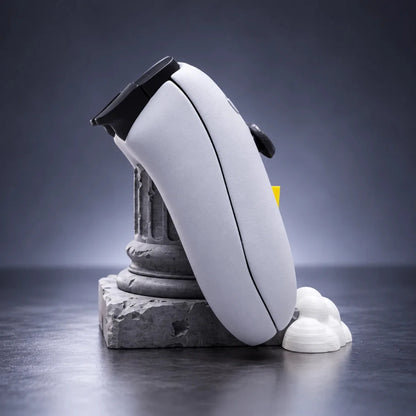 Side view of Olympus Pillar PS5 controller stand with stone pillar design, yellow lightning bolt and cloud accents 