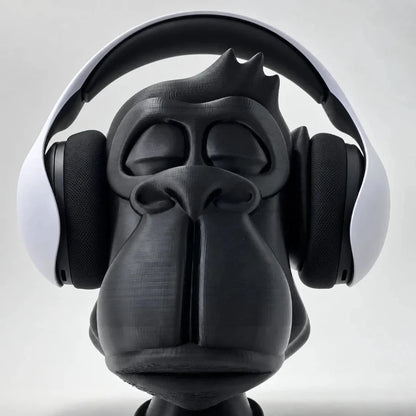 Zen Gorilla headphone stand, front view, displaying white over-ear wireless gaming headphones